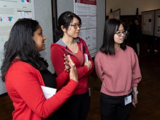 Public policy professor Anjali Adukia shares her research with Mind Bytes attendees, photo credit Alan Klehr 