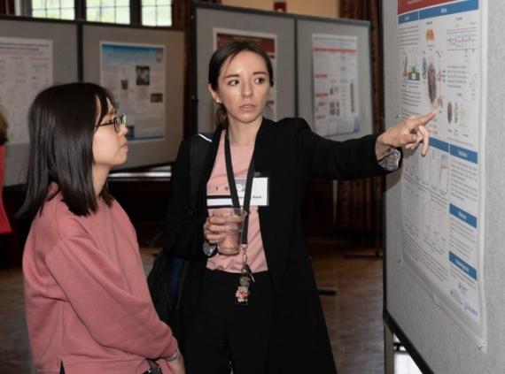 Researcher explains her work, photo credit Alan Klehr